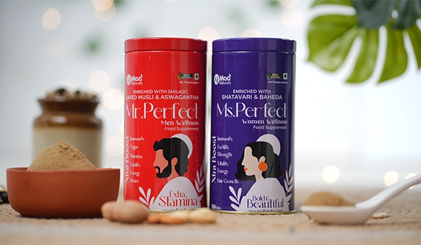 Mr Perfect Men Wellness and Ms Perfect Women Wellness herbal supplement containers with natural ingredients.
