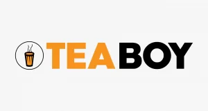 A logo for Tea Boy featuring a circular icon of a steaming glass of tea on the left, followed by the text "TEA" in orange and "BOY" in black, all in a bold sans-serif font.